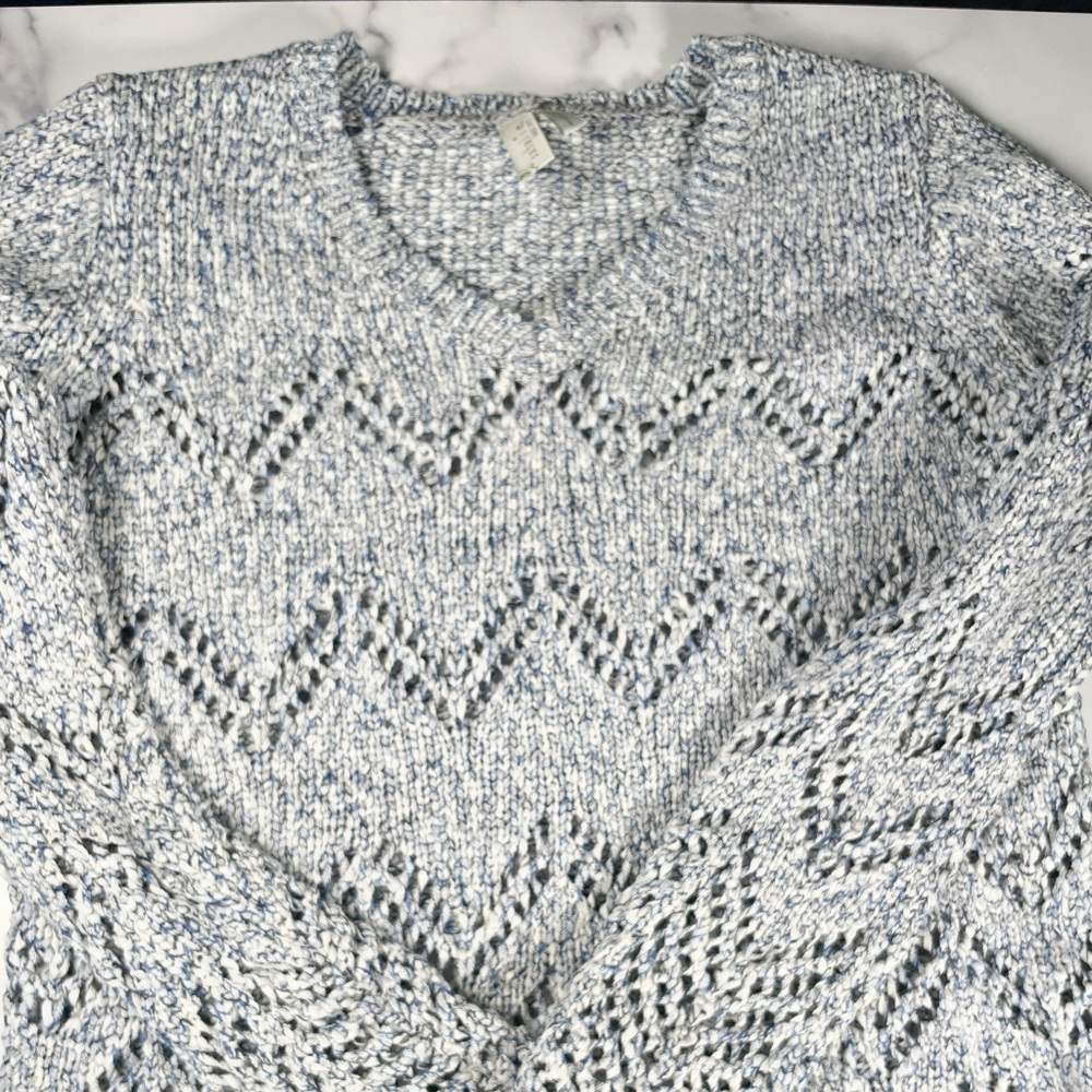 Blue v-neck knit sweater